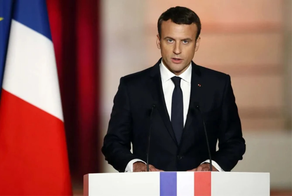 Macron decorates Indonesia leader before Buddhist temple visit