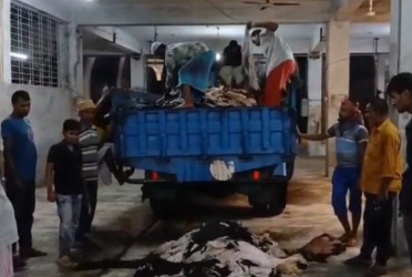 Tannery workers busy unloading, processing rawhides in Savar