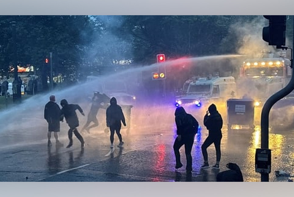 Police deploy water cannon against rioters amid anti-immigrants protest in Northern Ireland