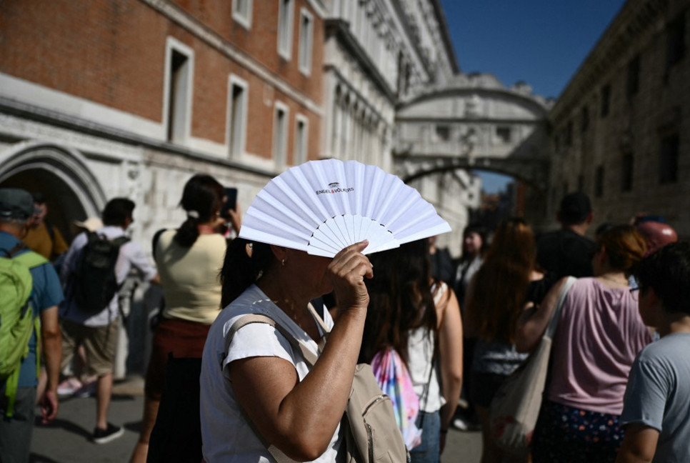 Europe bakes in summer's first heatwave as continent warm