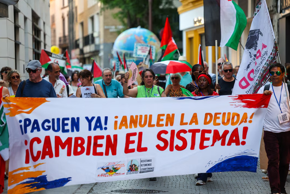 Protesters demand debt cancellation, climate action ahead of UN summit