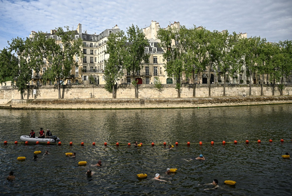 River Seine reopens to first Paris swimmers after century-long ban