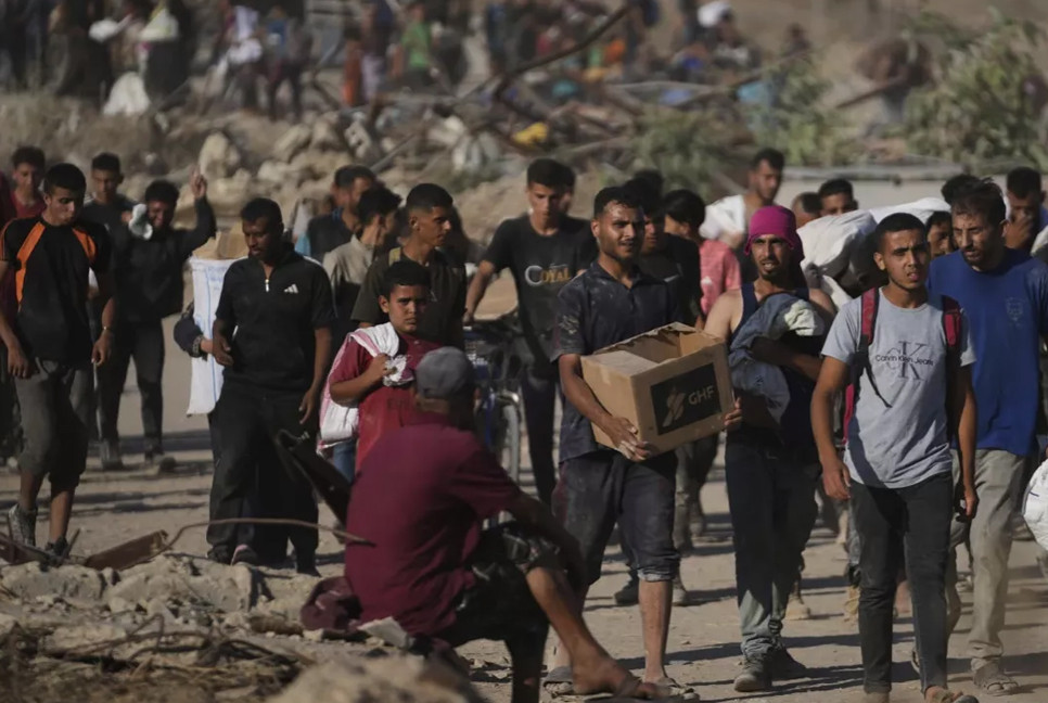 Israeli airstrikes kill 14 Palestinians in Gaza, another 10 people die seeking food