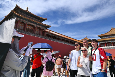 China extends visa-free entry to more than 70 countries to draw tourists