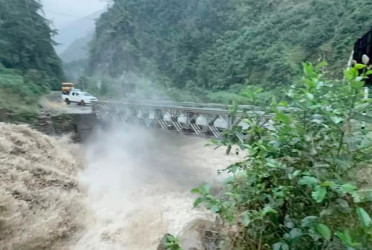Nepal flood: 9 dead, 19 missing, China bridge destroyed