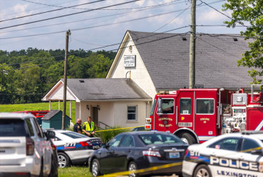 Two women killed at Kentucky church as gunman opens fire after shooting officer