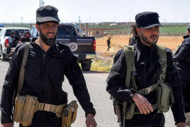 Clashes in southern Syria kill at least 30