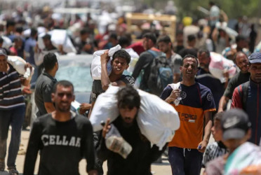 20 killed in crowd surge at Gaza aid site