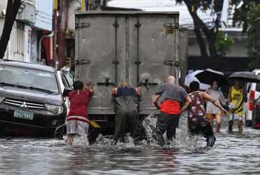 Philippines floods: Govt work halted, thousands evacuated