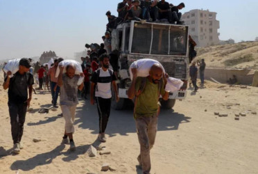 Gazans welcome aid plan but fear it will not end crisis
