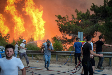 Wildfires threaten Turkey’s fourth-largest city as southern Europe battles blazes