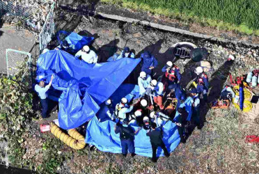 Four workers dead in Japan after manhole fall