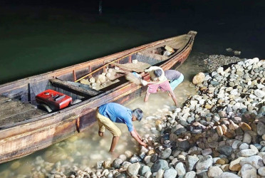 12,000 cubic feet of white stones recovered, dumped into river in Sylhet: Report