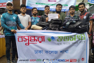 Bashundhara Shuvosangho stands beside freshers during admission process