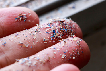 Humans inhale as much as 68,000 microplastic particles daily, study finds