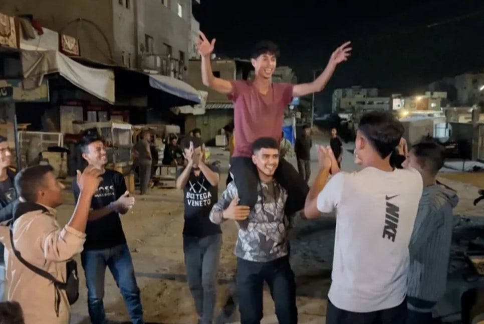 Palestinians in war-ravaged Gaza celebrate ceasefire news, joy in Tel Aviv