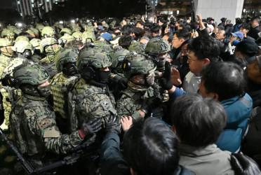 South Korea’s former PM, spy chief arrested over martial law declaration