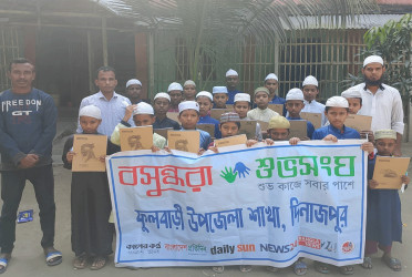 Educational materials distributed to orphaned children in Dinajpur