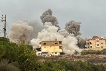 Israel launches new wave of air attacks on Lebanon, straining fragile truce