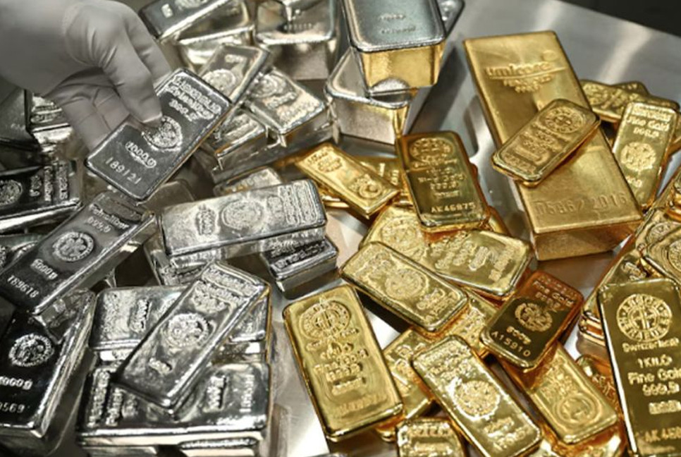 Silver falls from record peak as investors book profits