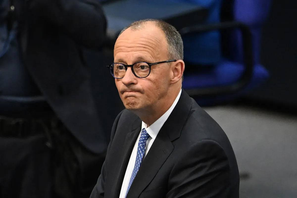 German Chancellor with Nazi family ties compares Putin to Hitler