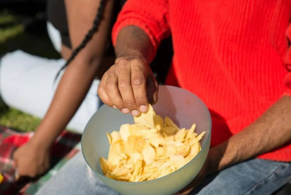 Britain begins ban on junk food ads on TV and online