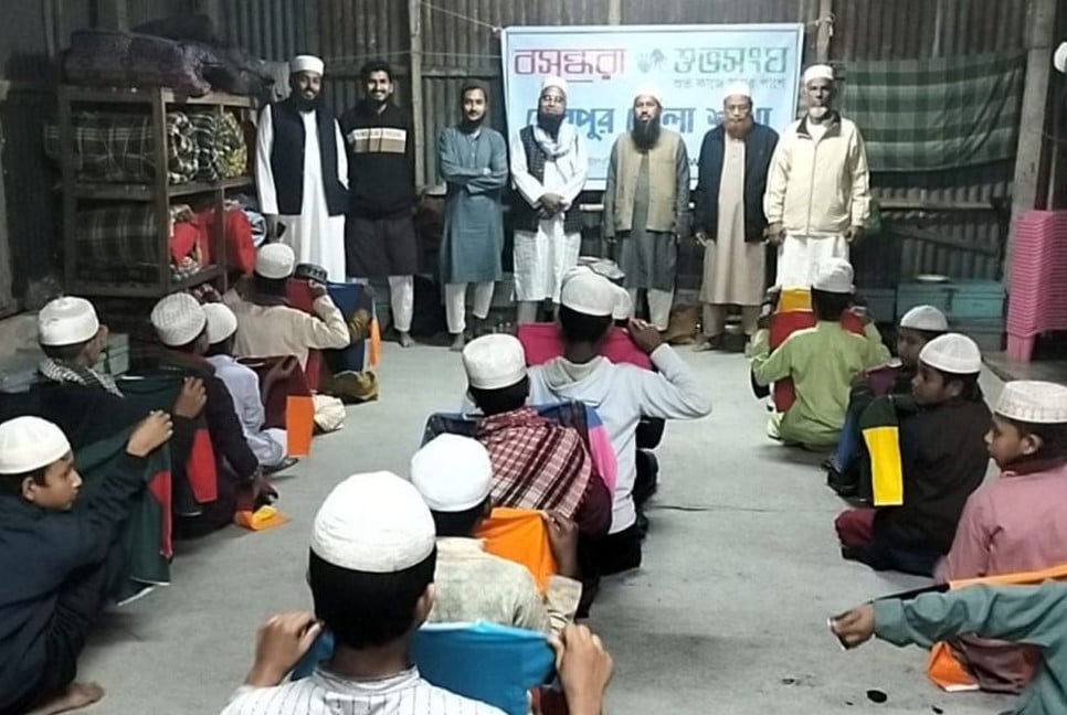 Shuvosangho distributes winter clothes in Sherpur