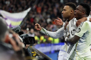 Mbappé penalty earns Real Madrid late win over 9-man Rayo