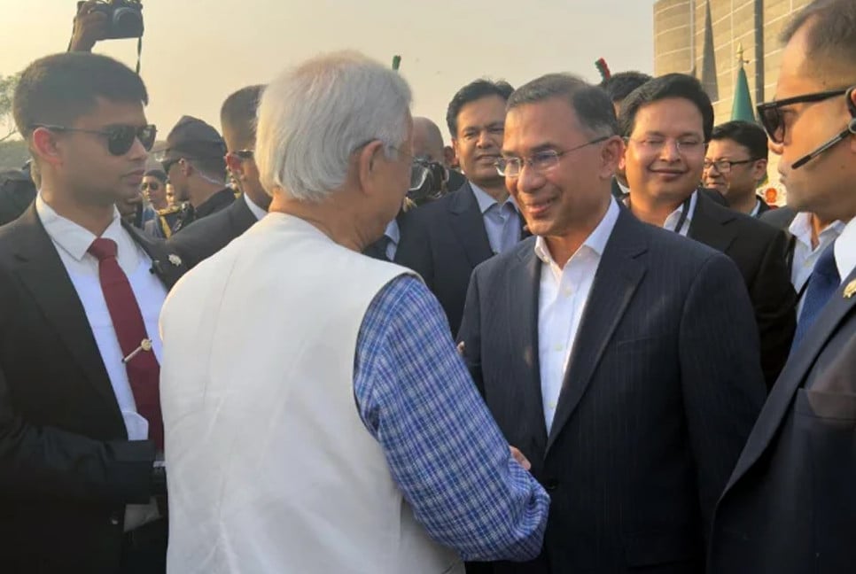 Prof Yunus exchanges greetings with PM