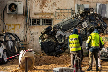 Iran hits Israeli police headquarters, satellite communications centre
