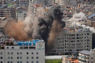 Israeli blitz stuns Beirut as scenes of horror unfold