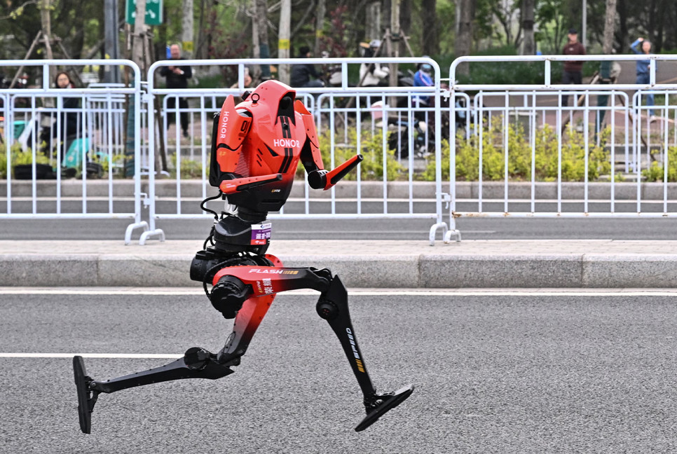 Humanoid robots show rapid advances as they race past humans in Beijing half-marathon