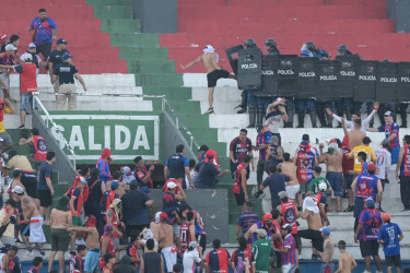 Clash halts Paraguay football match, multiple injured