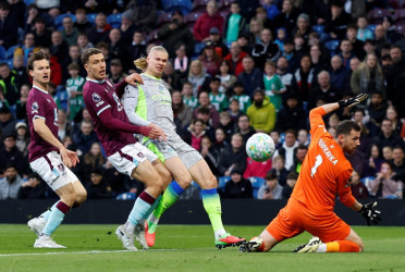 Manchester City go top of Premier League as Burnley relegated