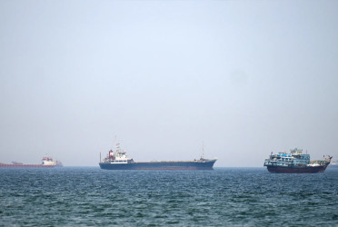 Iran warns of ceasefire violation as US plans to escort Hormuz ships