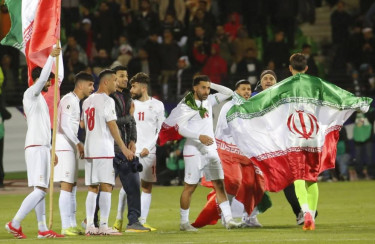 Iran says will play in World Cup, demands hosts accept conditions