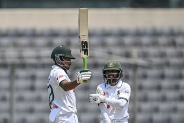 Shanto, Mominul fifties bolster Bangladesh as rain truncates day