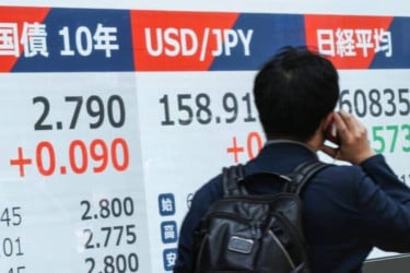 Asian stocks fall as oil surges amid US-Iran deadlock