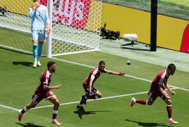 Qatar net late against Switzerland to secure historic first World Cup point