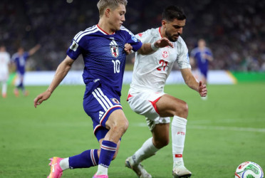 Japan thrash Tunisia 4-0 as Ueda scores twice
