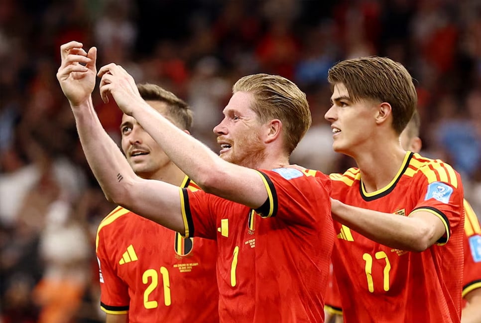 Belgium into World Cup last 32 with New Zealand rout